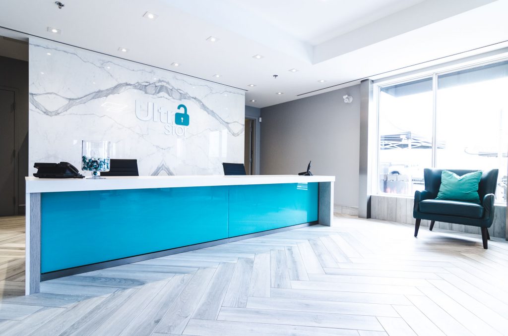 Welcome desk at UltraStor Burlington with guest seating.